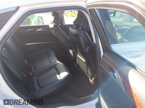 2016 Lincoln MKZ with VIN 3LN6L2G98GR632641, listed as a IAAI auction lot 41022028 with 50,625 mi miles and . Bid and sale history available at DreamBid. Image 8.