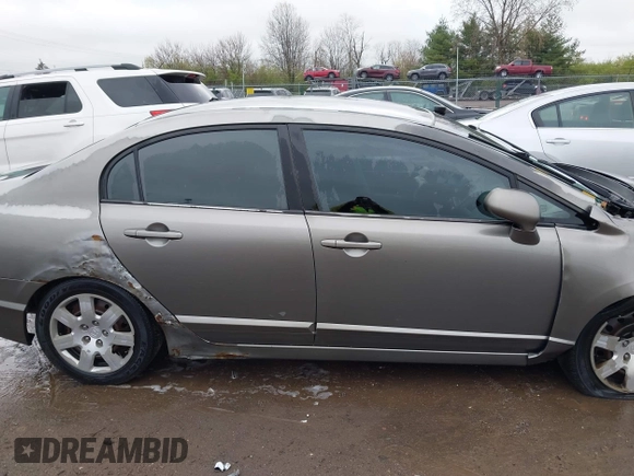 2008 Honda Civic LX with VIN 2HGFA16508H517923, listed as a IAAI auction lot 41990340 with 255,917 mi miles and . Bid and sale history available at DreamBid. Image 13.