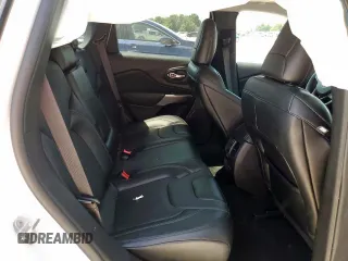 2022 Jeep Cherokee Limited z VIN 1C4PJMDX4ND551932, wystawiony jako Copart lot #58193475 z przebiegiem 30 274 mil mil oraz Szkoda całkowita • Salvage title. Historia ofert i sprzedaży dostępna na DreamBid. Obrazek 11.