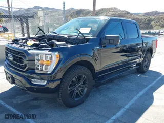2021 Ford F-150 XL with VIN 1FTFW1E5XMFC81231, listed as a IAAI auction lot 41598484 with 29,840 mi miles. Bid and sale history available at carsss.com. Image 2.