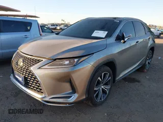 2022 Lexus RX with VIN 2T2HZMDA9NC332661, listed as a IAAI auction lot 41877725 with 19,045 mi miles. Bid and sale history available at carsss.com. Image 2.