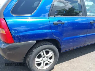 2007 Kia Sportage LX z VIN KNDJF723277303270, wystawiony jako IAAI lot #42388973 z przebiegiem 170 284 mil mil oraz . Historia ofert i sprzedaży dostępna na DreamBid. Obrazek 6.