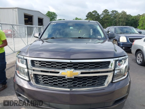 2015 Chevrolet Tahoe LS with VIN 1GNSCAKC0FR245826, listed as a IAAI auction lot 42282590 with 164,208 mi miles and . Bid and sale history available at DreamBid. Image 6.