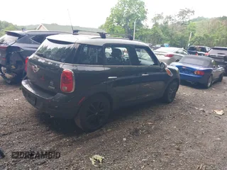 2012 MINI Countryman with VIN WMWZB3C5XCWM30191, listed as a IAAI auction lot 42435291 with 103,254 mi miles and . Bid and sale history available at DreamBid. Image 4.