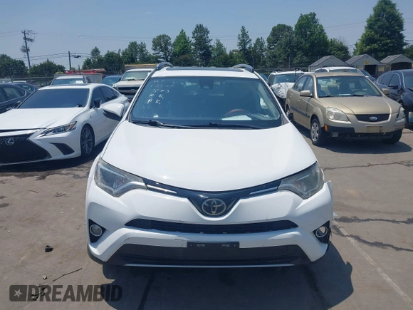 2018 Toyota RAV4 XLE z VIN 2T3WFREV1JW459553, wystawiony jako IAAI lot #42423474 z przebiegiem 129 523 mil mil oraz . Historia ofert i sprzedaży dostępna na DreamBid. Obrazek 12.