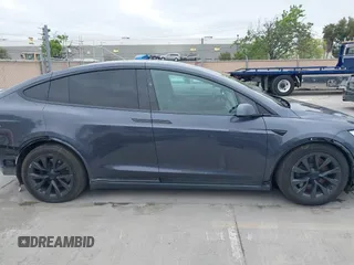 2022 Tesla Model X Plaid with VIN 7SAXCBE6XNF337687, listed as a IAAI auction lot 42035097 with 18,756 mi miles and . Bid and sale history available at DreamBid. Image 14.