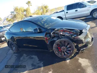 2023 Tesla Model Y Performance with VIN 7SAYGDEF6PF854797, listed as a IAAI auction lot 41319332 with 46,132 mi miles and . Bid and sale history available at DreamBid. Image 13.