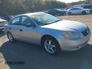 2002 Nissan Altima SL with VIN 1N4AL11E82C215662, listed as a IAAI auction lot 40637969 with 999,999 mi miles. Bid and sale history available at carsss.com. Image 1.