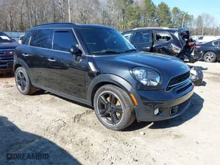 2015 MINI Cooper Countryman S with VIN WMWZC3C5XFWT04916, listed as a IAAI auction lot 41636369 with 101,448 mi miles. Bid and sale history available at carsss.com. Image 1.