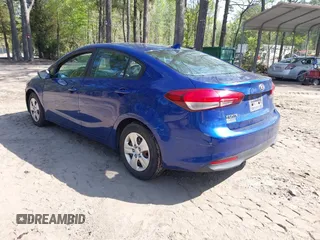 2017 Kia Forte LX with VIN 3KPFK4A70HE052223, listed as a IAAI auction lot 42036382 with 136,671 mi miles. Bid and sale history available at carsss.com. Image 3.