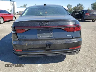 2024 Audi A8 with VIN WAULDAF86RN003891, listed as a Copart auction lot 77408804 with 4,812 mi miles and Salvage Title. Bid and sale history available at carsss.com. Image 6.