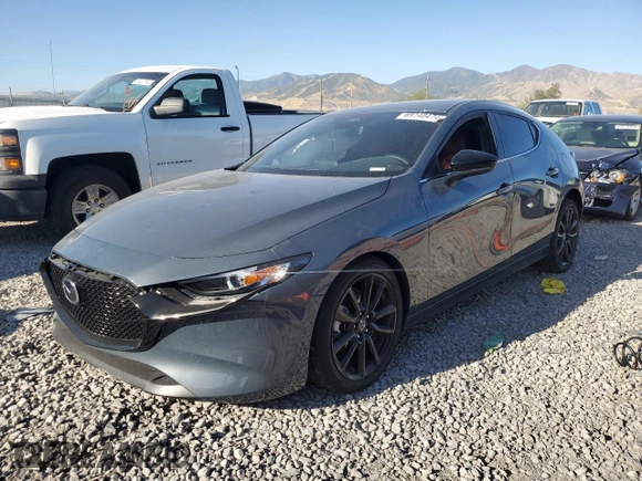 2024 Mazda 3 S Carbon Edition with VIN JM1BPBLM4R1714705, listed as a Copart auction lot 69140474 with 1,808 mi miles and Salvage Title. Bid and sale history available at DreamBid. Image 1.