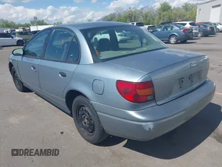 2002 Saturn SL z VIN 1G8ZS52862Z269002, wystawiony jako IAAI lot #42079357 z przebiegiem 250 721 mil mil oraz . Historia ofert i sprzedaży dostępna na DreamBid. Obrazek 3.