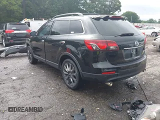 2015 Mazda CX-9 Grand Touring with VIN JM3TB2DA1F0464517, listed as a IAAI auction lot 42484985 with 104,932 mi miles and . Bid and sale history available at DreamBid. Image 3.