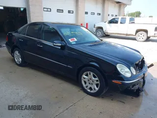 2003 Mercedes-Benz E-Class 3.2L with VIN WDBUF65J93A234140, listed as a IAAI auction lot 40313345 with 1 mi miles. Bid and sale history available at carsss.com. Image 1.