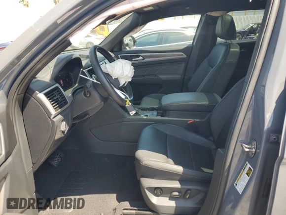 2023 Volkswagen Atlas SE z VIN 1V2JE2CAXPC216712, wystawiony jako Copart lot #58608325 z przebiegiem 22 649 mil mil oraz Szkoda całkowita • Salvage title. Historia ofert i sprzedaży dostępna na DreamBid. Obrazek 7.