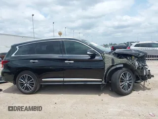 2020 Infiniti QX60 Pure with VIN 5N1DL0MM3LC524411, listed as a IAAI auction lot 42292734 with 51,221 mi miles and . Bid and sale history available at DreamBid. Image 14.