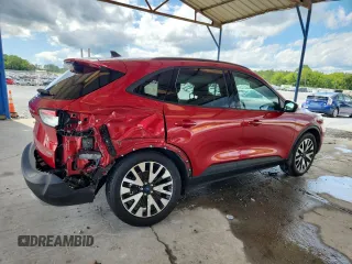 2020 Ford Escape SE Sport Hybrid with VIN 1FMCU9BZ2LUB98087, listed as a Copart auction lot 59051985 with 66,690 mi miles and Salvage title. Bid and sale history available at DreamBid. Image 3.