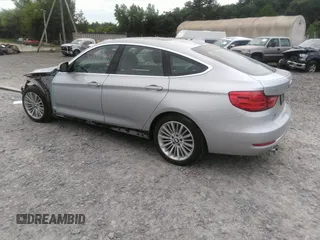 2014 BMW 3 Series 328i Gran Turismo xDrive z VIN WBA3X5C58ED558625, wystawiony jako IAAI lot #42473401 z przebiegiem 106 419 mil mil oraz . Historia ofert i sprzedaży dostępna na DreamBid. Obrazek 3.