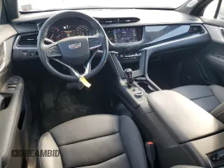 2023 Cadillac XT6 FWD Premium Luxury with VIN 1GYKPCRS0PZ231233, listed as a Copart auction lot 73210244 with 14,604 mi miles and Salvage Title. Bid and sale history available at carsss.com. Image 8.