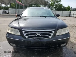 2009 Hyundai Azera Limited z VIN KMHFC46F29A341228, wystawiony jako Copart lot #55204355 z przebiegiem 156 251 mil mil oraz Szkoda całkowita • Salvage title. Historia ofert i sprzedaży dostępna na DreamBid. Obrazek 5.