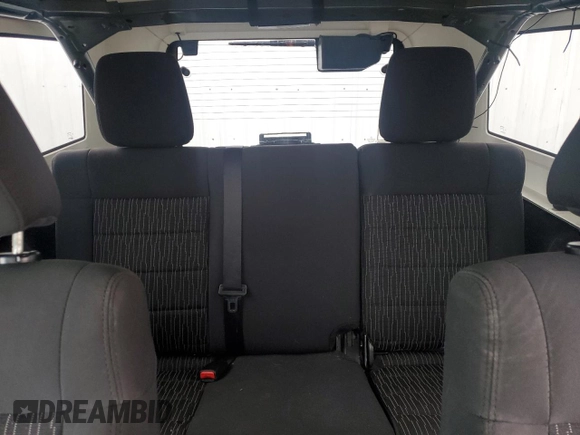 2012 Jeep Wrangler Unlimited Sport with VIN 1C4HJWDG8CL122067, listed as a Copart auction lot 58549805 with 124,658 mi miles and Clean title. Bid and sale history available at DreamBid. Image 10.