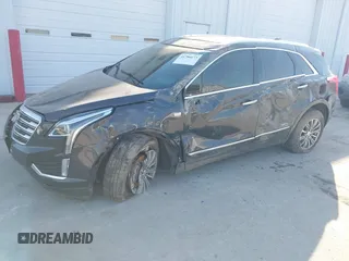 2017 Cadillac XT5 Luxury FWD with VIN 1GYKNBRS0HZ105603, listed as a IAAI auction lot 41786673 with 75,482 mi miles. Bid and sale history available at carsss.com. Image 2.