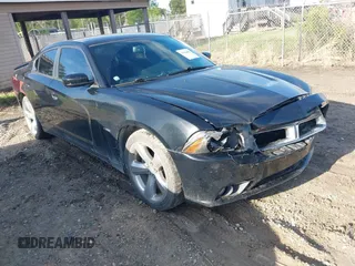 2014 Dodge Charger RT with VIN 2C3CDXCTXEH337797, listed as a IAAI auction lot 41964687 with 102,659 mi miles. Bid and sale history available at carsss.com. Image 1.