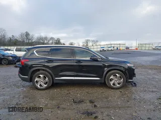 2021 Hyundai Santa Fe SEL with VIN 5NMS24AJ0MH357850, listed as a IAAI auction lot 41207381 with 123,584 mi miles. Bid and sale history available at carsss.com. Image 13.