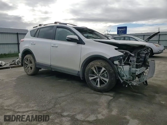 2018 Toyota RAV4 XLE with VIN 2T3WFREV1JW471752, listed as a Copart auction lot 46952565 with 87,705 mi miles and Salvage Title. Bid and sale history available at DreamBid. Image 11.