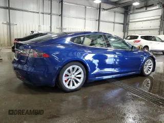2016 Tesla Model S 90D z VIN 5YJSA1E40GF172712, wystawiony jako Copart lot #63698725 z przebiegiem 99 405 mil mil oraz Szkoda całkowita • Salvage title. Historia ofert i sprzedaży dostępna na DreamBid. Obrazek 3.