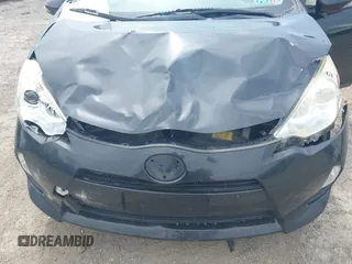 2014 Toyota Prius One with VIN JTDKDTB32E1074592, listed as a IAAI auction lot 42078851 with Not Provided miles and . Bid and sale history available at DreamBid. Image 6.
