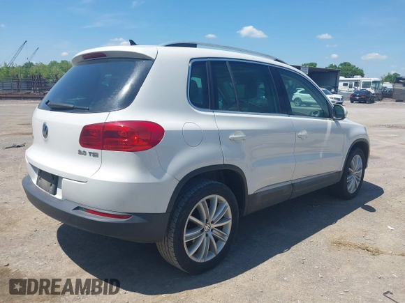2013 Volkswagen Tiguan SE with VIN WVGAV7AX4DW528410, listed as a IAAI auction lot 42142132 with 148,511 mi miles and . Bid and sale history available at DreamBid. Image 4.