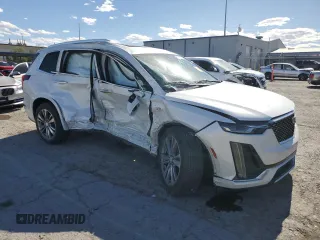 2020 Cadillac XT6 FWD Premium Luxury with VIN 1GYKPCRS8LZ177562, listed as a Copart auction lot 57123195 with Not provided miles and Salvage title. Bid and sale history available at DreamBid. Image 4.