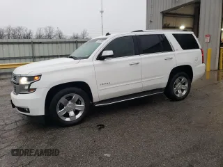 2015 Chevrolet Tahoe LTZ z VIN 1GNSKCKC4FR218675, wystawiony jako Copart lot #51591565 z przebiegiem 119 989 mil mil oraz Szkoda całkowita • Salvage title. Historia ofert i sprzedaży dostępna na DreamBid. Obrazek 1.