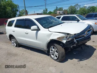 2012 Dodge Durango SXT z VIN 1C4RDJAG1CC213071, wystawiony jako IAAI lot #39502604 z przebiegiem 166 576 mil mil oraz . Historia ofert i sprzedaży dostępna na DreamBid. Obrazek 1.