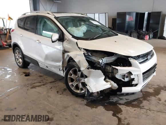 2016 Ford Escape Titanium with VIN 1FMCU9J90GUA18743, listed as a IAAI auction lot 42419730 with 102,666 mi miles and . Bid and sale history available at DreamBid. Image 1.