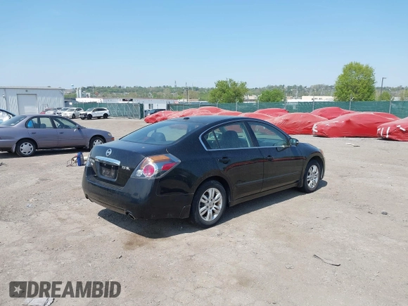 2011 Nissan Altima 2.5 S with VIN 1N4AL2AP5BN516577, listed as a IAAI auction lot 42112826 with 98,512 mi miles. Bid and sale history available at carsss.com. Image 4.
