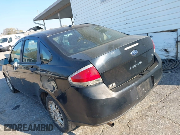 2008 Ford Focus SE with VIN 1FAHP35N28W209484, listed as a IAAI auction lot 41892438 with 311,456 mi miles. Bid and sale history available at carsss.com. Image 3.