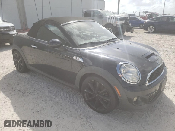 2012 MINI Roadster S z VIN WMWSY3C52CT144319, wystawiony jako Copart lot #78349654 z przebiegiem Nie podano mil oraz Szkoda całkowita • Salvage title. Historia ofert i sprzedaży dostępna na DreamBid. Obrazek 4.
