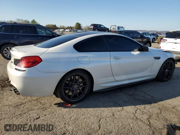 2015 BMW M6 z VIN WBSLX9C51FD160757, wystawiony jako Copart lot #51991315 z przebiegiem 71 133 mil mil oraz Szkoda całkowita • Salvage title. Historia ofert i sprzedaży dostępna na DreamBid. Obrazek 3.