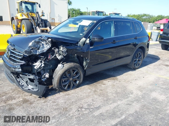 2024 Volkswagen Tiguan SE with VIN 3VVNB7AXXRM199400, listed as a IAAI auction lot 42216941 with 11,581 mi miles and . Bid and sale history available at DreamBid. Image 2.