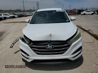 2016 Hyundai Tucson SE z VIN KM8J23A4XGU243394, wystawiony jako Copart lot #56556265 z przebiegiem 91 305 mil mil oraz Szkoda całkowita • Salvage title. Historia ofert i sprzedaży dostępna na DreamBid. Obrazek 5.
