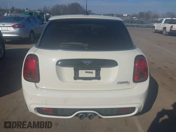 2021 MINI Hardtop 4 Door Cooper S with VIN WMWXU9C00M2P04693, listed as a IAAI auction lot 41785185 with 57,848 mi miles and . Bid and sale history available at DreamBid. Image 16.