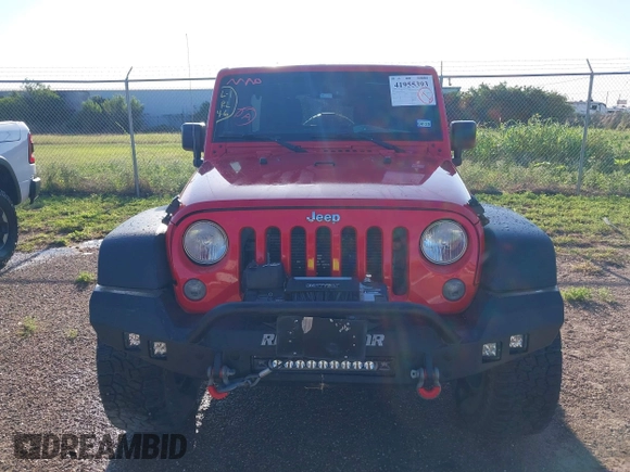 2015 Jeep Wrangler Unlimited Willys Wheeler with VIN 1C4BJWDG0FL635341, listed as a IAAI auction lot 41955393 with 145,529 mi miles and . Bid and sale history available at DreamBid. Image 6.