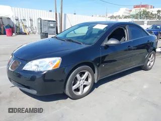 2006 Pontiac G6 6-Cyl with VIN 1G2ZG558964261910, listed as a IAAI auction lot 42028627 with 149,703 mi miles. Bid and sale history available at carsss.com. Image 2.