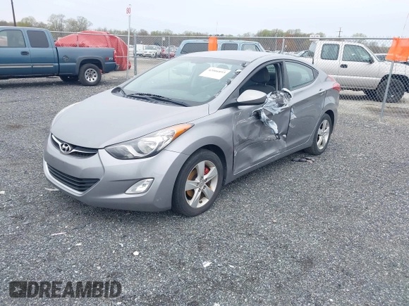 2012 Hyundai Elantra Limited with VIN KMHDH4AE2CU433033, listed as a IAAI auction lot 42006893 with 124,892 mi miles. Bid and sale history available at carsss.com. Image 2.