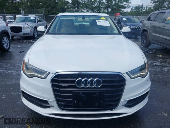 2014 Audi A6 Prestige with VIN WAUHGAFCXEN091050, listed as a IAAI auction lot 42524560 with 169,575 mi miles and . Bid and sale history available at DreamBid. Image 12.