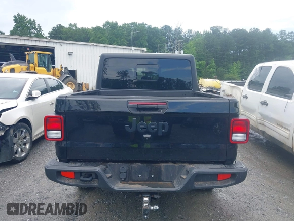 2023 Jeep Gladiator Sport S z VIN 1C6HJTAG3PL521954, wystawiony jako IAAI lot #42502126 z przebiegiem 49 606 mil mil oraz . Historia ofert i sprzedaży dostępna na DreamBid. Obrazek 16.