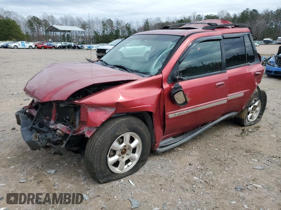2003 GMC Envoy SLE with VIN 1GKDT13S332136423, listed as a Copart auction lot 49301635 with 148,669 mi miles and Salvage Title. Bid and sale history available at carsss.com. Image 1.